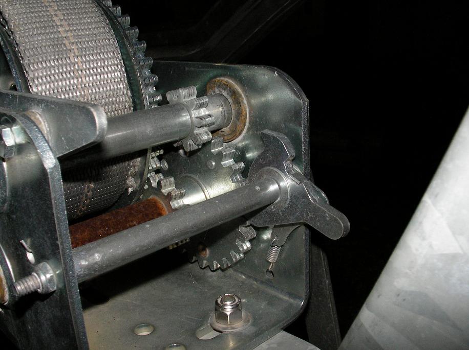 A ratchet pawl on the far side